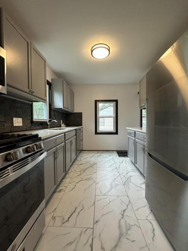 Another angle of the Kitchen including the floor.jpg
