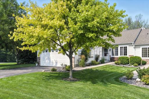Welcome home to this beautiful end unit townhome in with no neighbors to the west or behind located in a cul de sac in the heart of Maple Grove