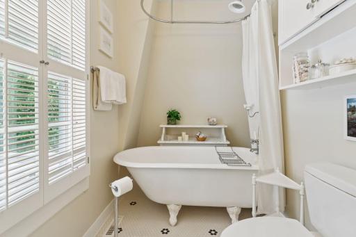 Charming full bath with a classic clawfoot tub