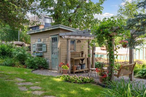 Original 1937 garden shed with pergola, swing and sitting area