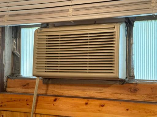 A look at the window AC unit in the garage structure.