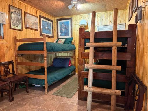 Views of the additional living/recreational space inside finished garage. Currently setup with bunk beds, but this is not a legal bedroom.
