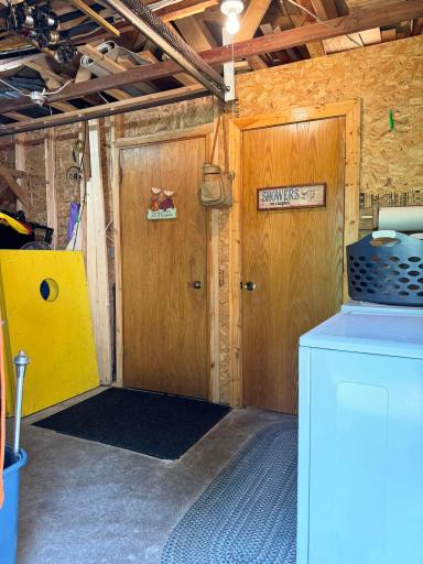 A peek as you step into the garage structure, with excellent storage capacity, and the convenience of having washer/dryer facilities on site as well!