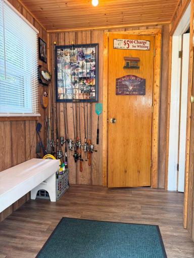 A shot of the entryway. The 1/2 bathroom is through the door at the rear in this photo.
