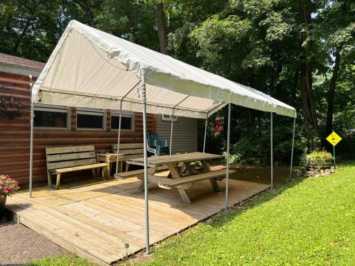 A shot of the picnic area on the deck, covered with carport to provide that desired shade at times of the day!