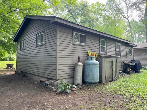 Another angle of the cabin's exterior from the backyard.