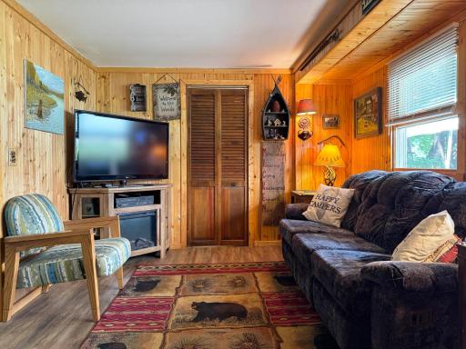 A warm and inviting living room to relax in, and the cozy electric fireplace kicks out a ton of heat when needed on the cool nights or mornnings in spring and fall!