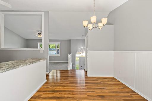 Dining room open to kitchen and living room.