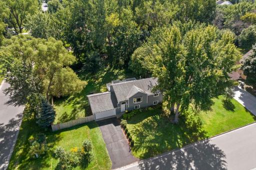 Home is sited on over 1/3 acre, fenced, corner lot.