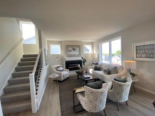 Sun-filled turned stair-case to 2nd floor & Gathering Room with fireplace!