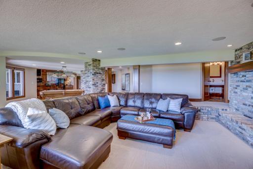 The walkout lower level is an entertainerâs dream with a full kitchen/bar, generous living & rec. spaces, a wine cellar, & sauna.
