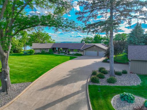 The heated 3-car attached garage and heated 2-car detached garage offer functional space for vehicles, storage, and/or hobbies. Donât miss the incredible opportunity!