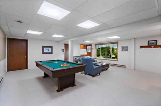 Walkout Lower Level has a Huge Family Room, wood burning fireplace, additional 3/4 bathroom, office area (could be 4th bedroom)!