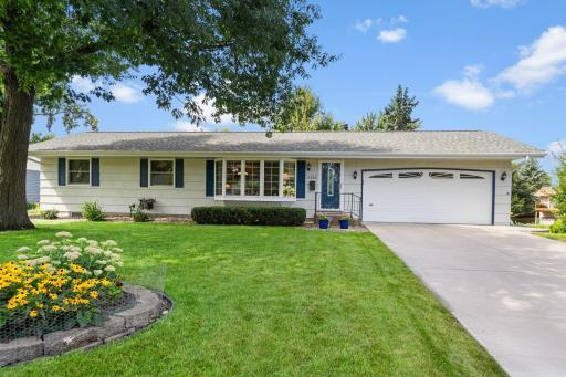 WOW! DOUBLE WOW!! This one is sure to impress!! Meticulously maintained walkout rambler with a truly one-of-a-kind back yard!
