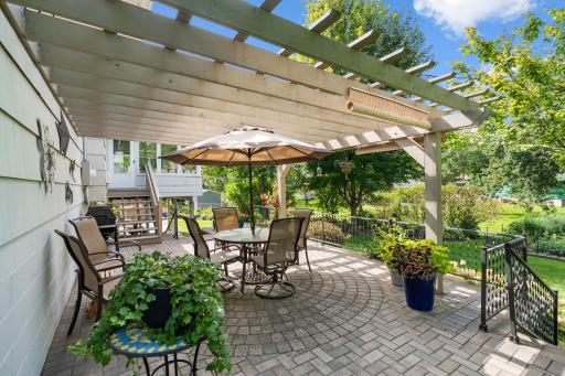 Upper Level Paver Patio with Trellis and stairs to access 4 season porch!