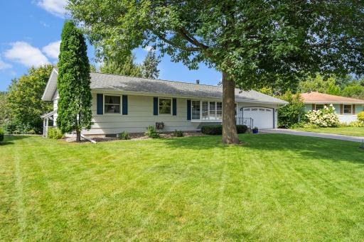 WOW! DOUBLE WOW!! This one is sure to impress!! Meticulously maintained walkout rambler with a truly one-of-a-kind back yard!