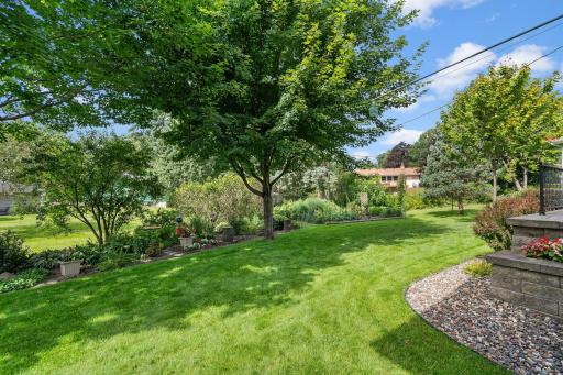 Private views of back yard meticulously landscaped!