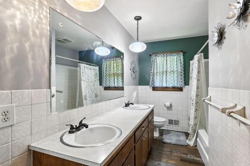 Full bathroom located on the main level for easy access and everyday convenience.