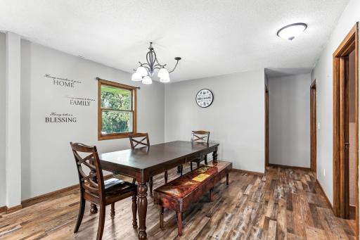 Informal dining area adjacent to the kitchen offers comfort and easy access for everyday meals.