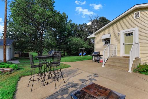 Outdoor patio provides a seamless extension of living space for entertaining or unwinding.