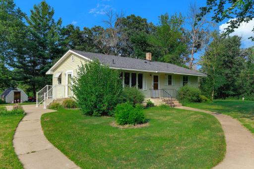 Enjoy the warmth of this inviting rambler, perfectly nestled on 5 beautiful acres with space for hobbies and outdoor living.