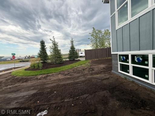 Enjoy the neighborhood entryway landscaping and fence from your corner lot with extra privacy!