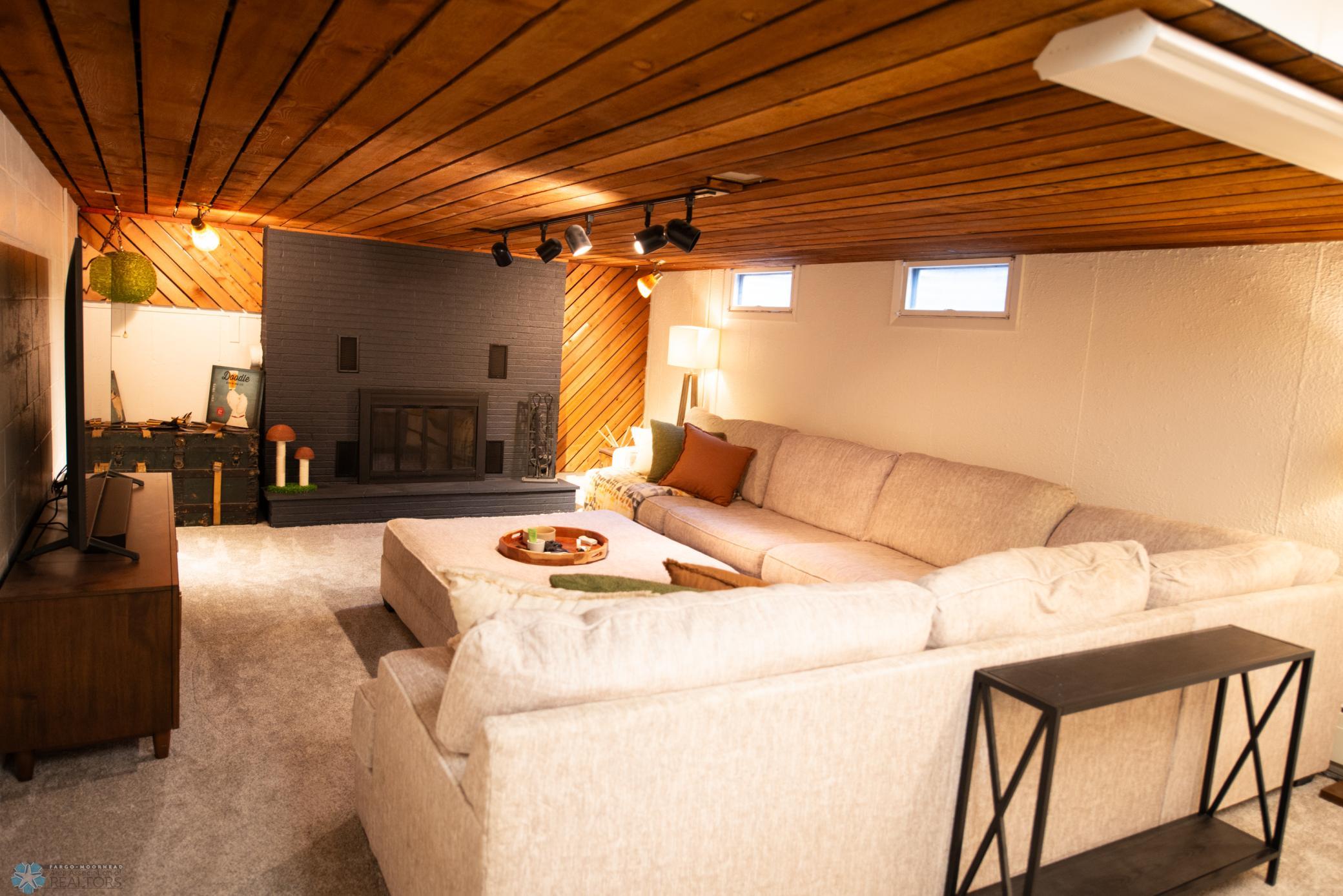 family room w/ wood burning fp
