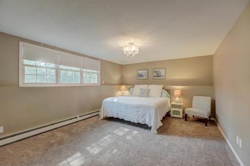 The extra large third bedroom located on the lower level offers privacy and comfort
