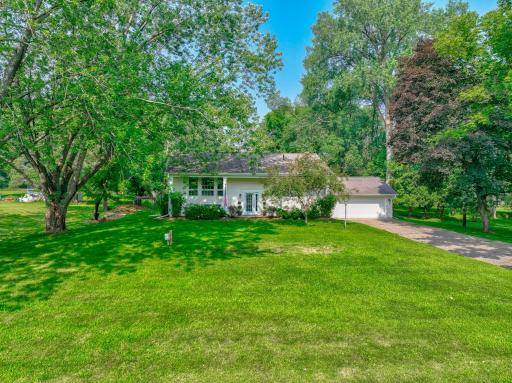 Beautifully renovated home offering seasonal river views with seasonal river views in the winter!
