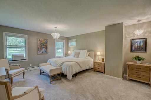 Convenient main level primary suite features walk in closet