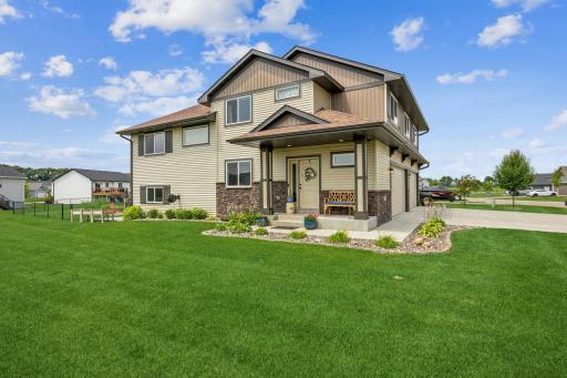WOW! An amazing tri-level in a beautiful neighborhood! Nestled on a large corner lot, this one is LOADED with extras!