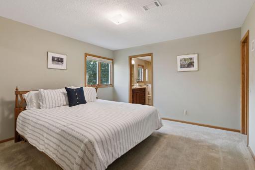 Your primary suite features a walk-in closet and your own updated ensuite bathroom!