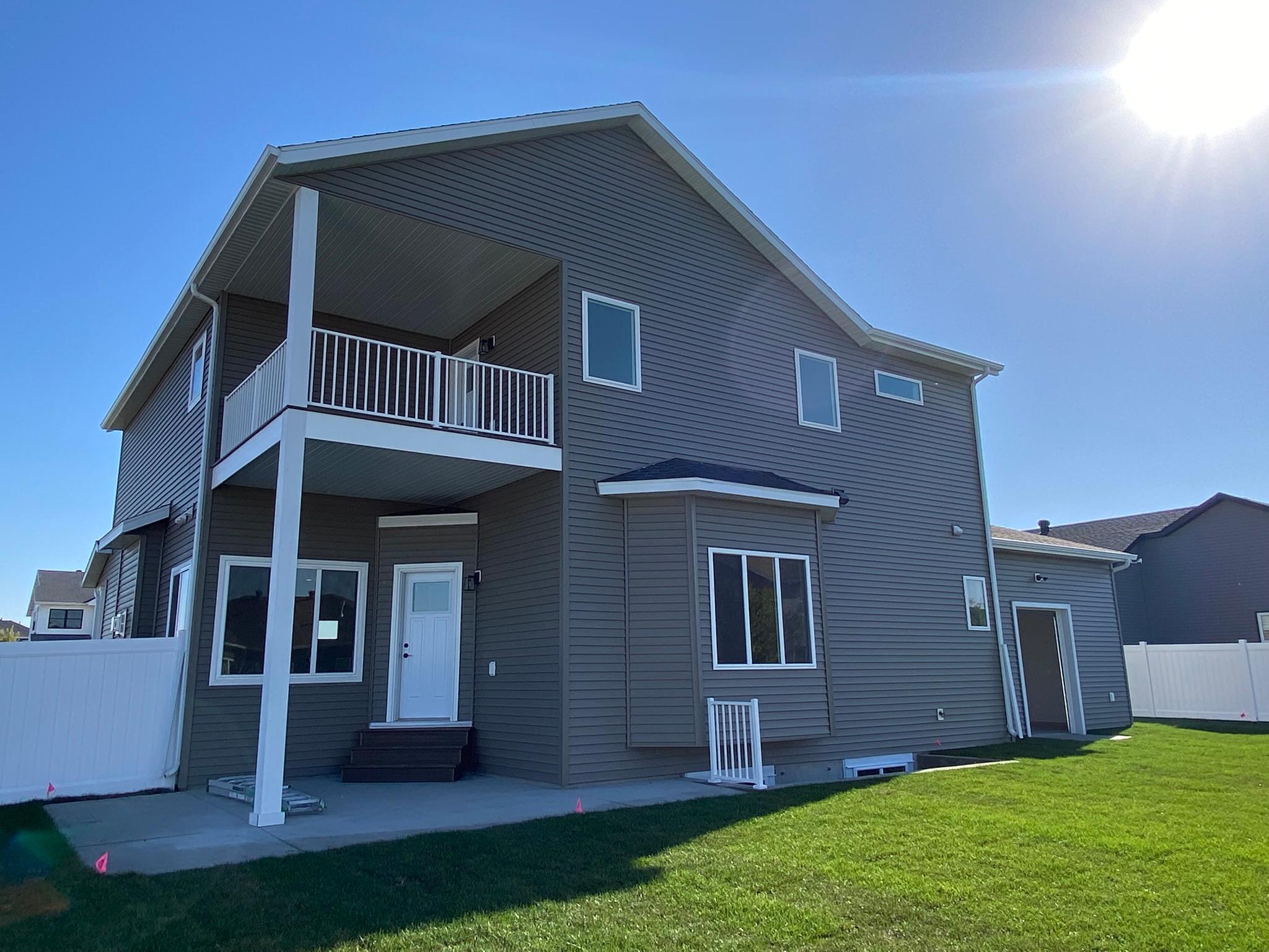 Main Level Patio/Private Primary Deck Above