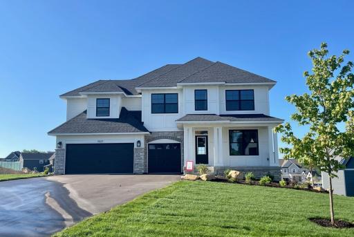 Stunning curb appeal with 4 sided architecture - no vinyl siding.
