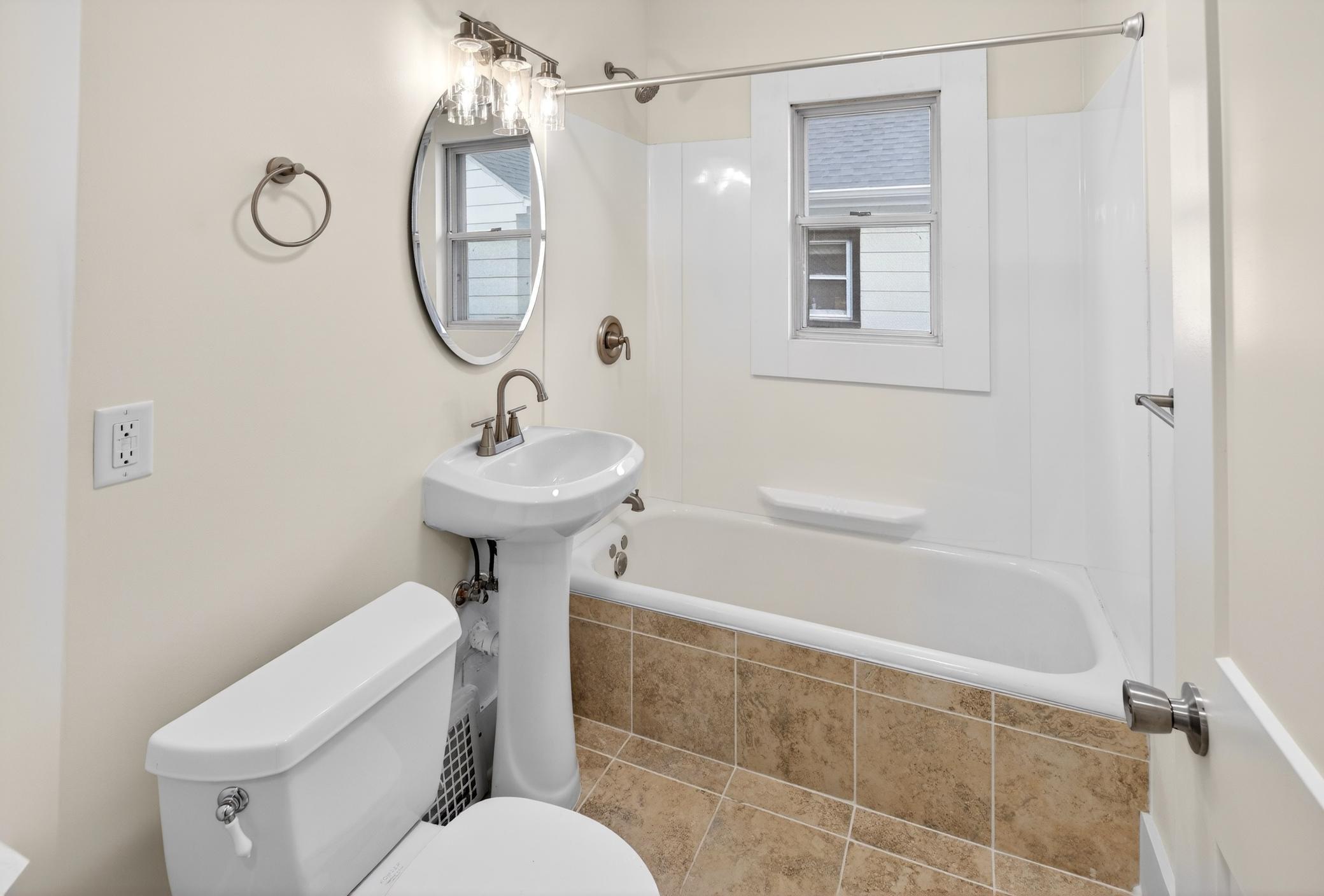 This bathroom has been completely updated with new plumbing and electrical and now includes a newly added shower for everyday convenience. A clean space ready for your personal touch.
