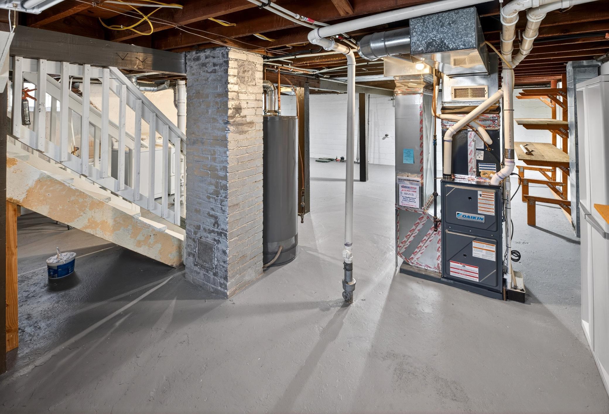 This lower level has plenty of room for storage along with the opportunity to finish an additional room or two to add SF. The furnace and A/C are from 2022, the water heater is from 2021.