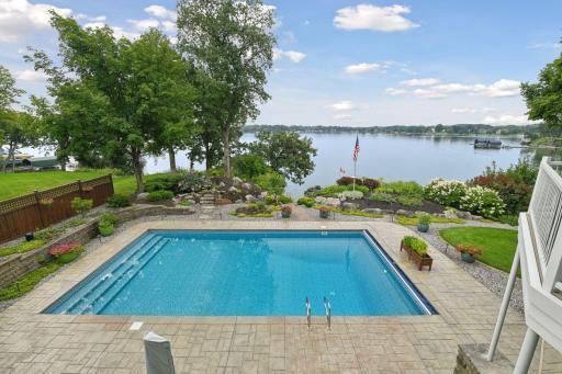 Enjoy lakeside living with a 20’ x 40’ saltwater pool + tranquil waterfall feature.