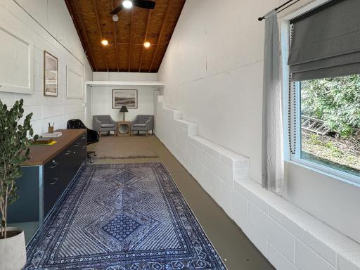 Addition is staged as an office has room for 2 flex spaces and upper walls have insulation and plywood