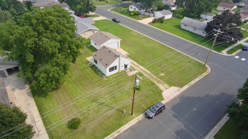 Welcome to 414 2nd Ave NE with a large corner .32 acre lot