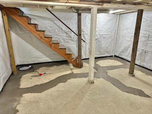 Basement after tile & wall work completed
