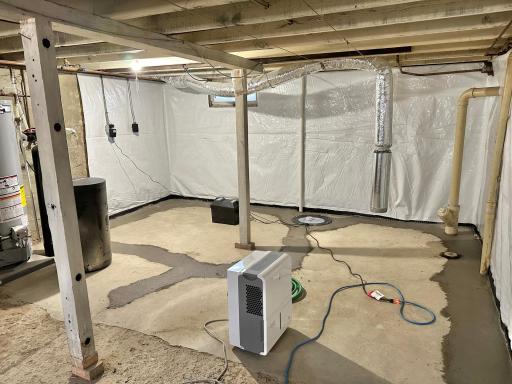 Basement after tile & wall work completed