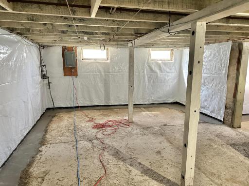 Basement after tile & wall work completed