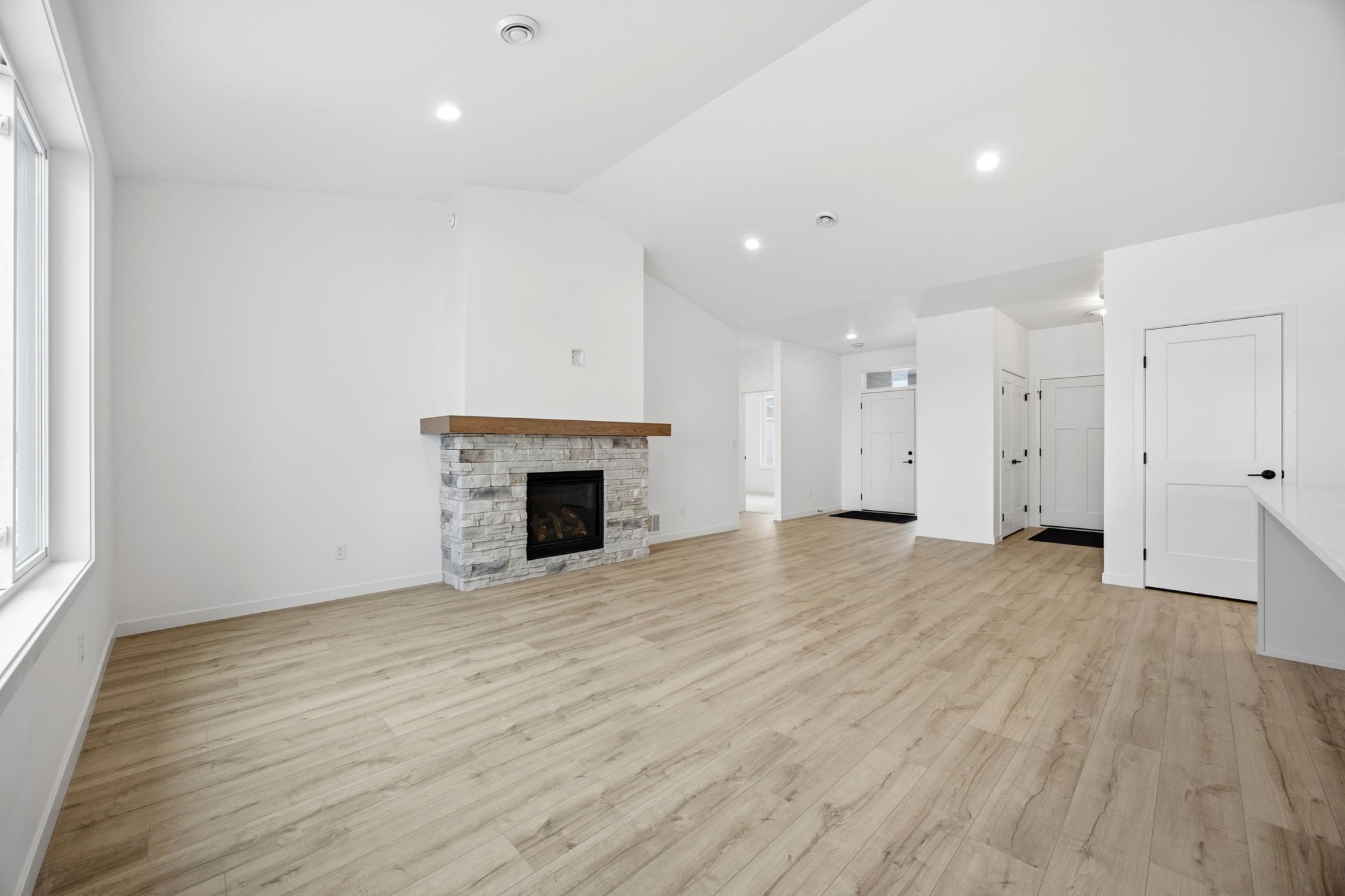 Living Room with Stone Surround Fireplace