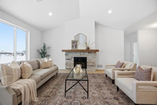 Living Room with Stone Surround Fireplace