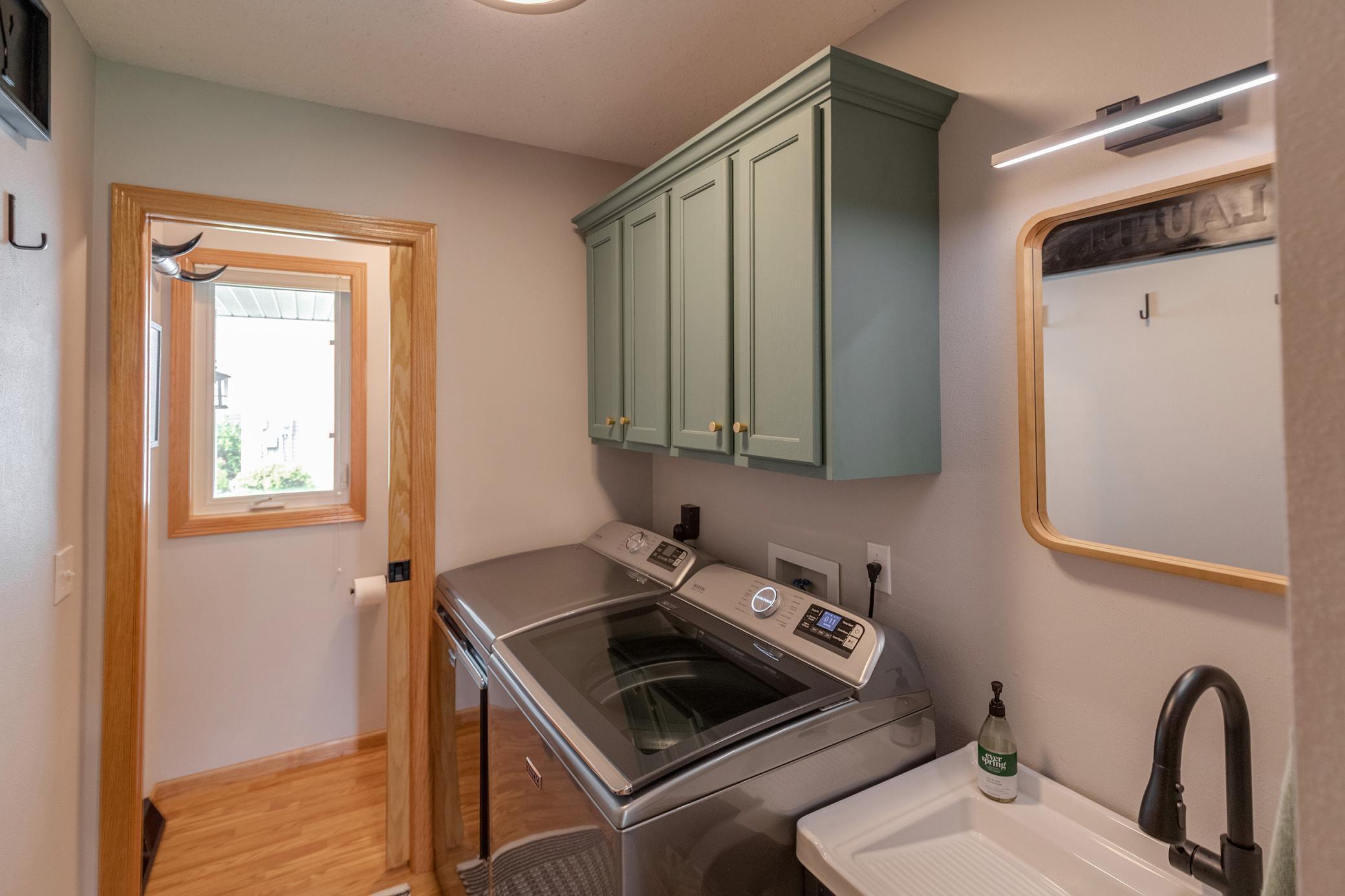 Main level guest bath and laundry