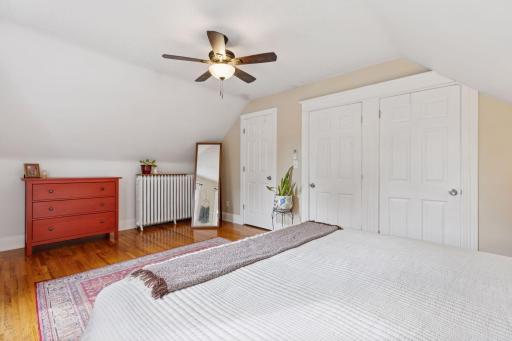 Spacious primary bedroom on upper level with walk-in closet