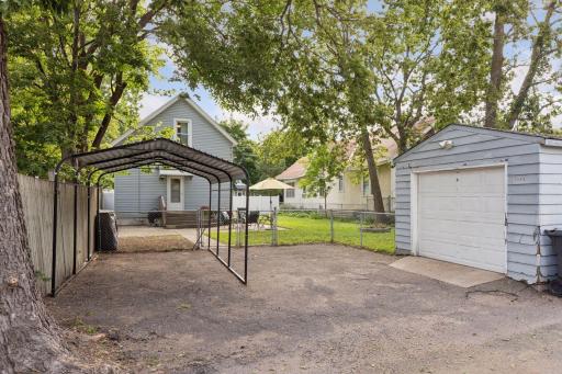 Single stall garage with carport for additional off-street parking