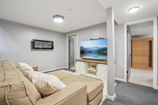28_Lower Level Included electric fireplace.jpg