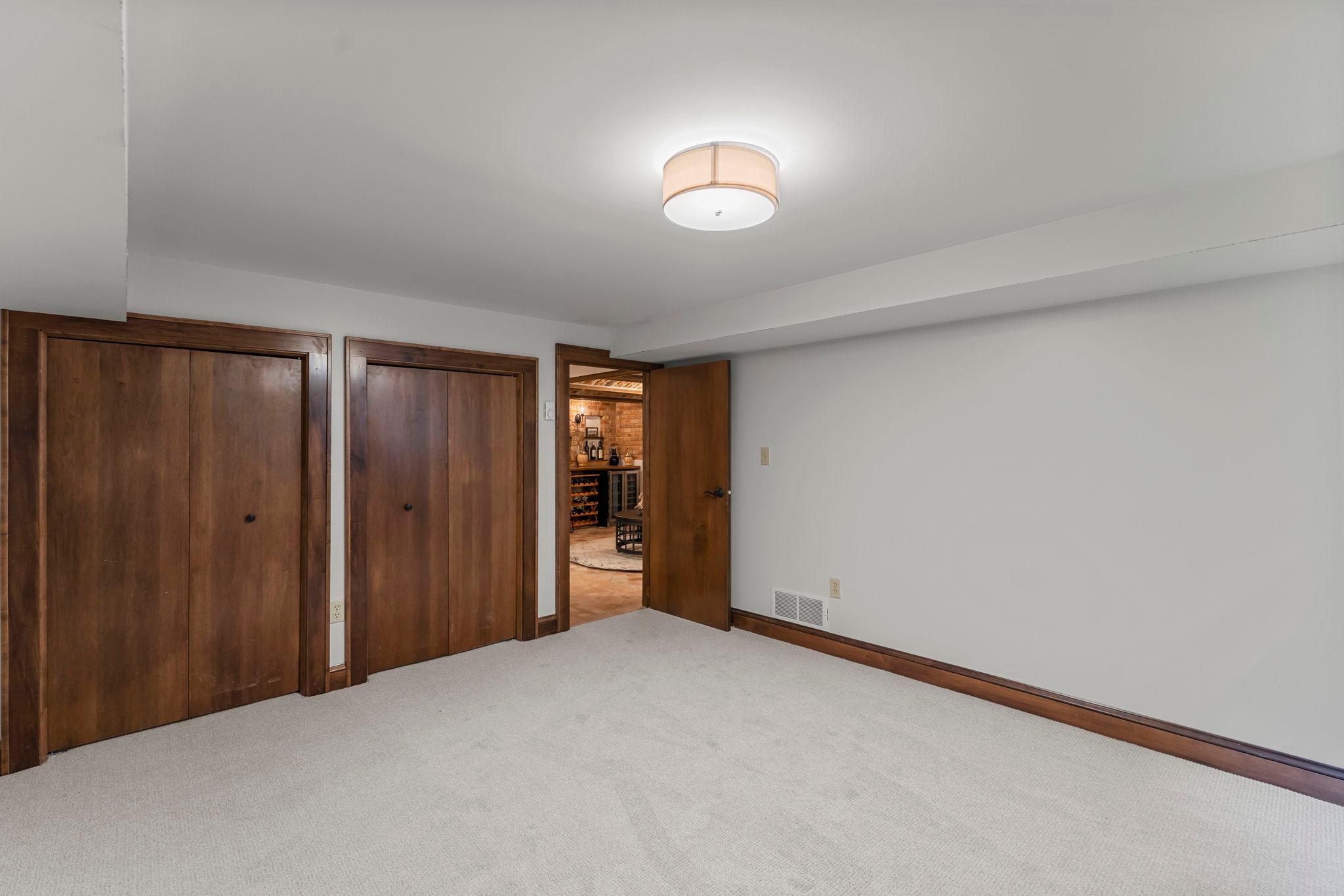 Also on this level is a fourth bedroom with double closets, perfect for guests!
