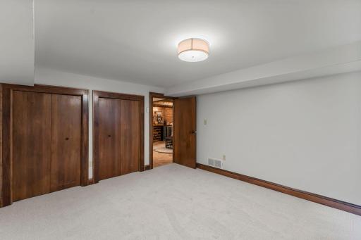 Also on this level is a fourth bedroom with double closets, perfect for guests!